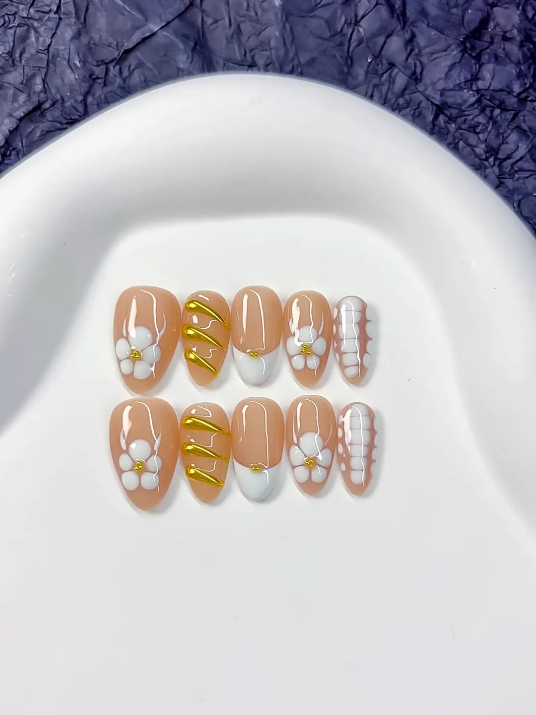 Handmade press on nails short almond nude with 3D flowers centerpiece view