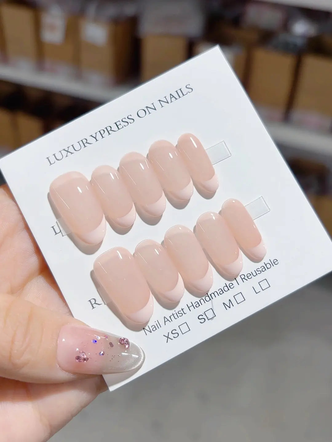 Medium almond nude pink handmade press on nails full set view