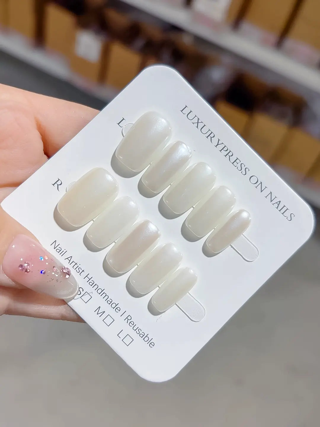 medium square white glazed handmade press on nails on display card, close view