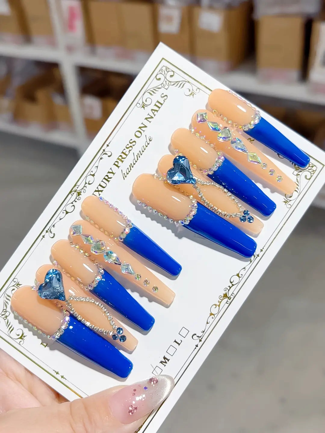 Angled view highlighting crystal chains, blue tips and scattered silver rhinestones