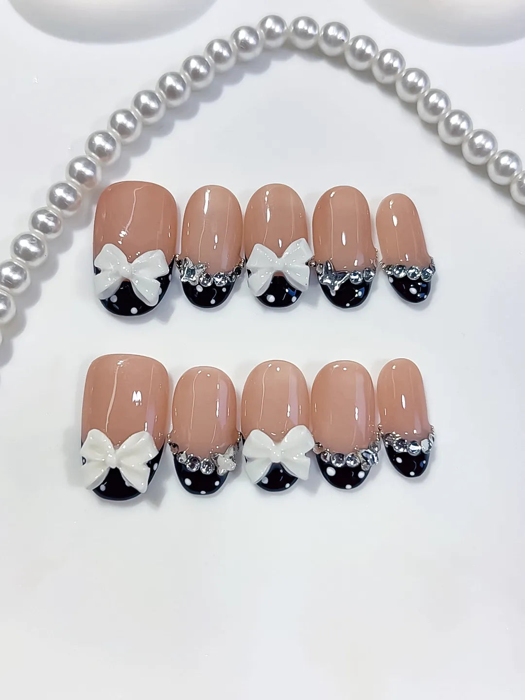 Nude Black White French tip Bow Rhinestone press on nails close up