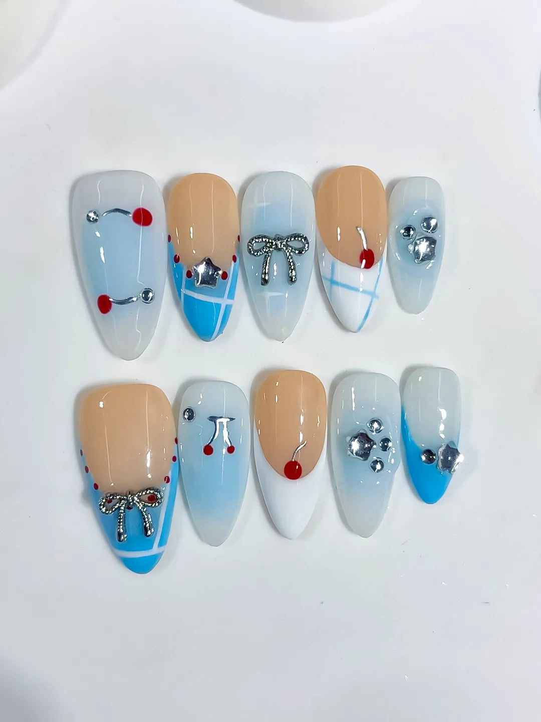Nude Blue White French tip Bow Heart Cherry Rhinestone press on nails angled view