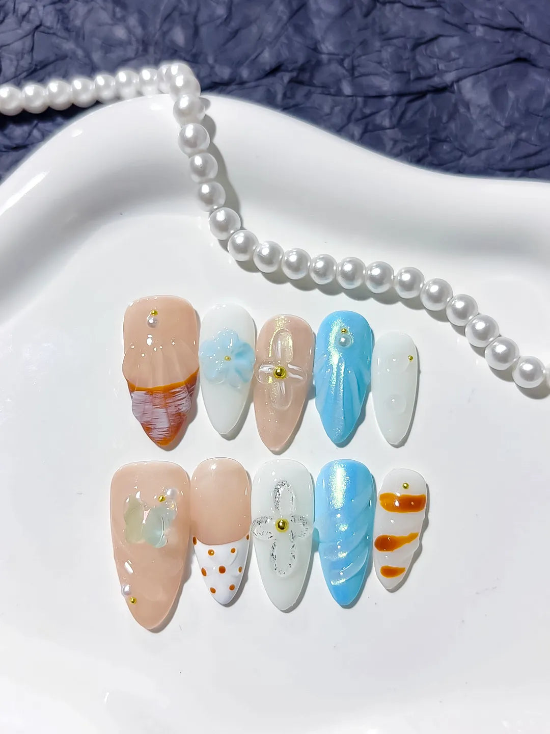 Nude Blue White Orange Abstract Bow Dot Pattern Flower press on nails close up