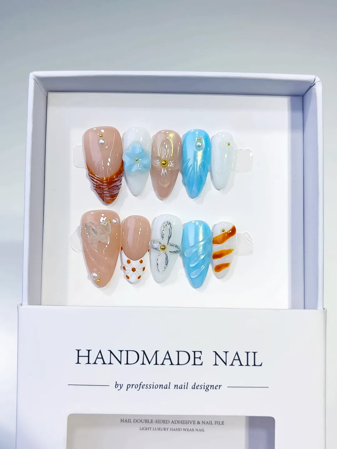 Nude Blue White Orange Abstract Bow Dot Pattern Flower press on nails full set view