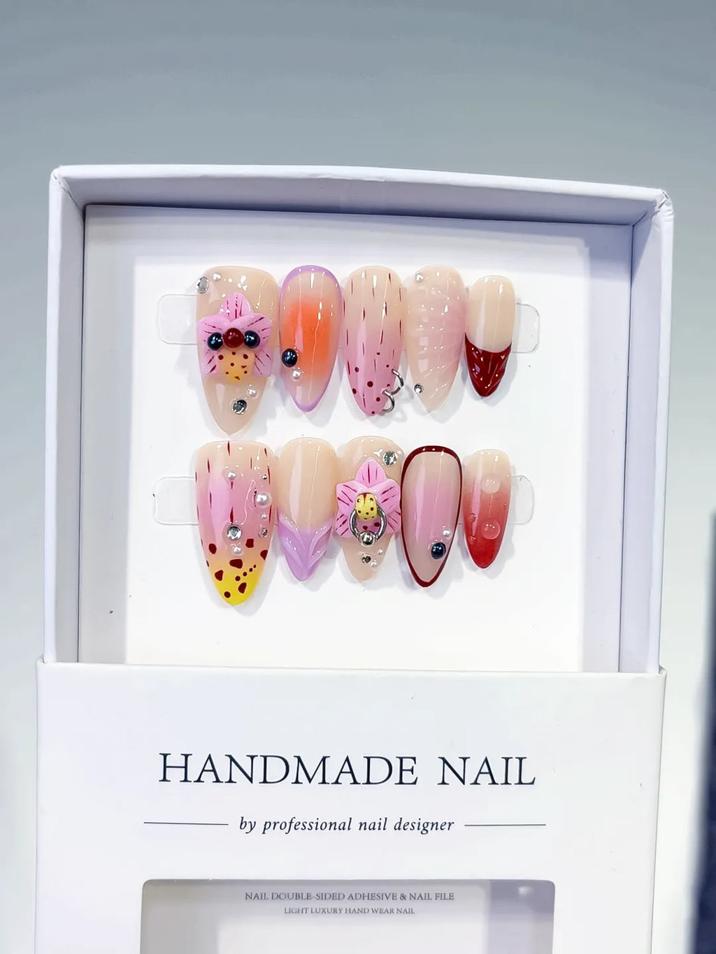 Nude Pink Yellow Red Abstract Bow Ladybug Rhinestone press on nails full set view