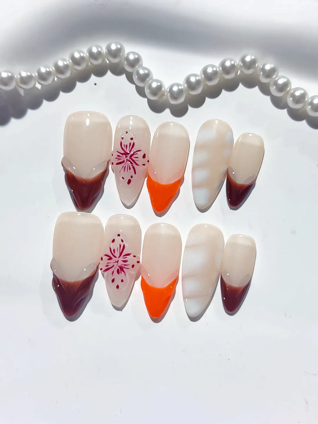 Nude Brown Orange White French tip Flower 3D press on nails detail view