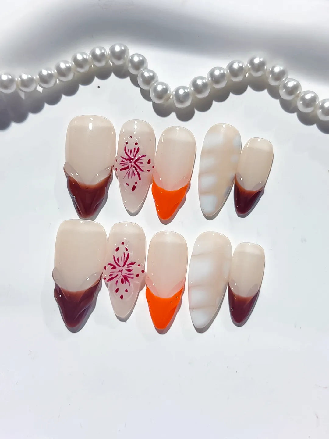 Nude Brown Orange White French tip Flower 3D press on nails detail view