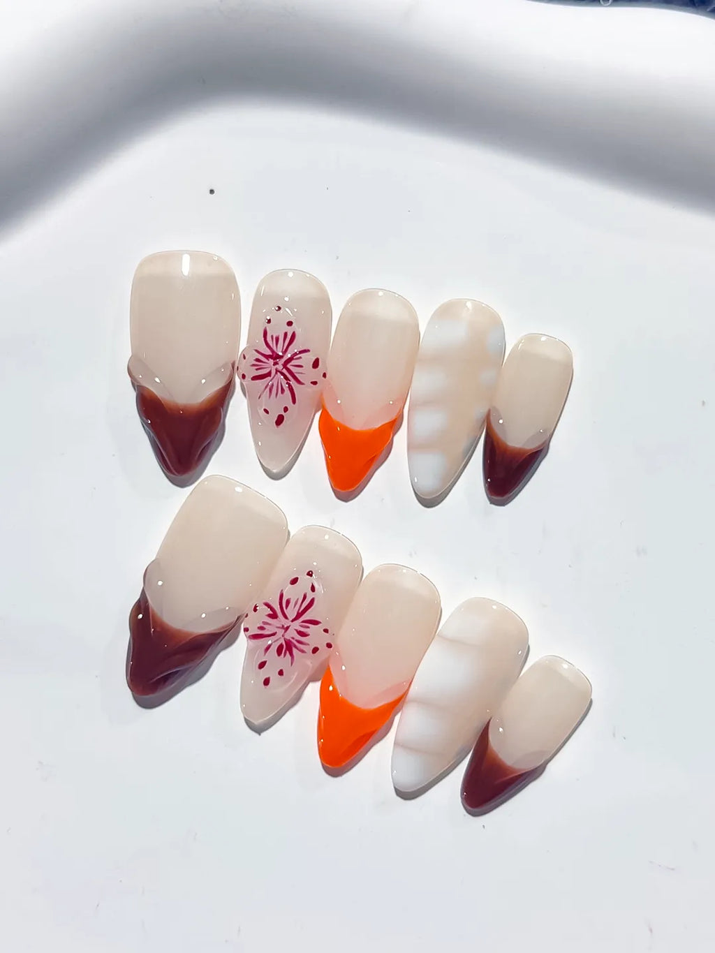 Nude Brown Orange White French tip Flower 3D press on nails detail view