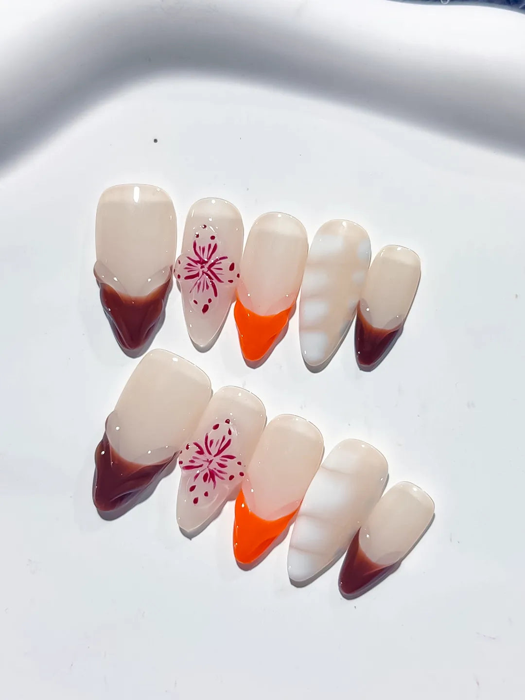 Nude Brown Orange White French tip Flower 3D press on nails detail view