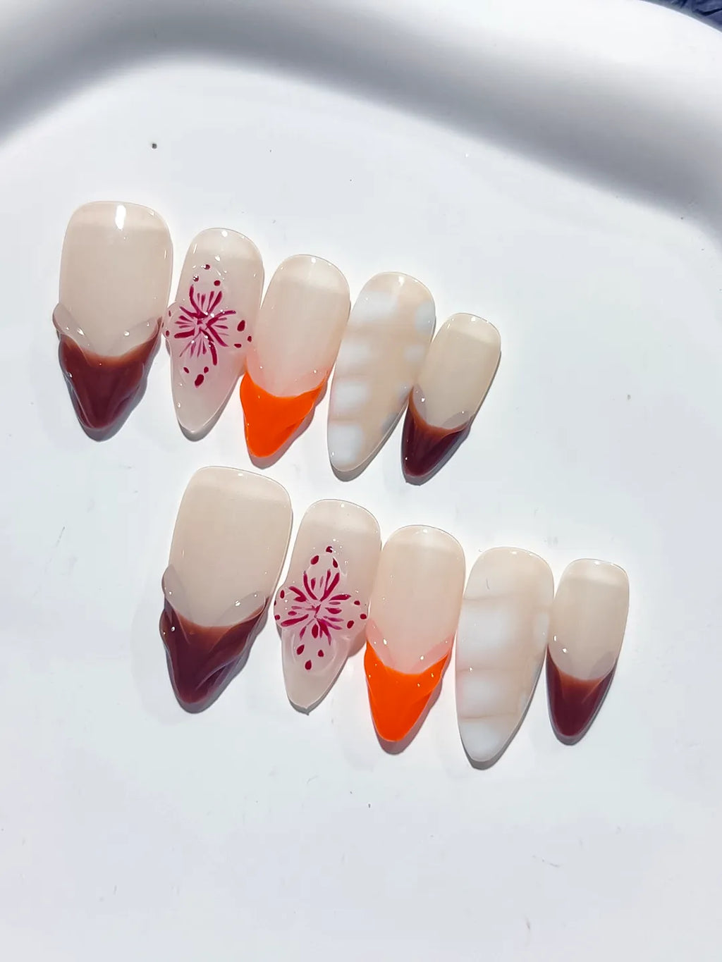 Nude Brown Orange White French tip Flower 3D press on nails detail view