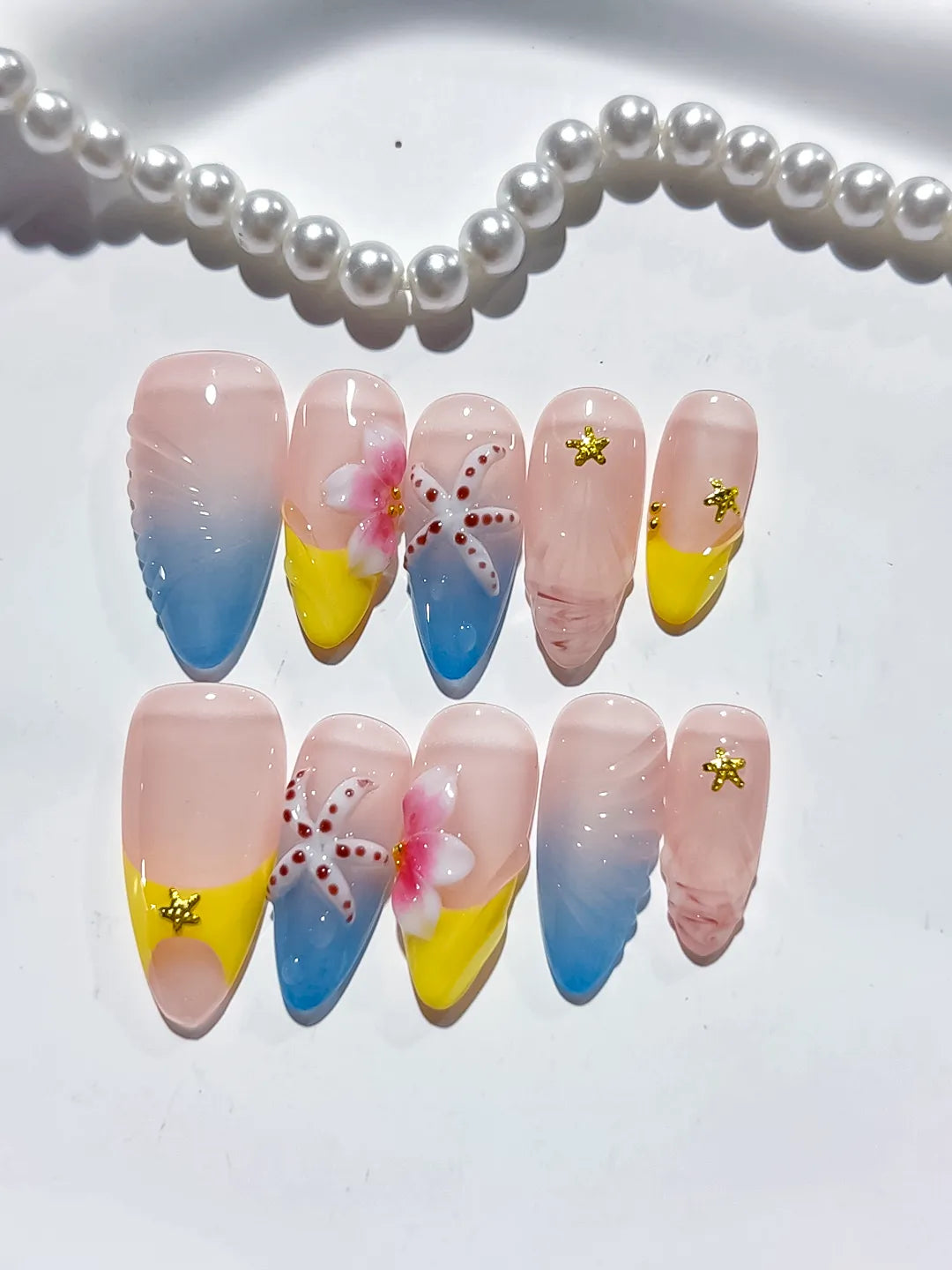 Nude Blue Yellow Pink Abstract Flower Starfish Shell press on nails detail view