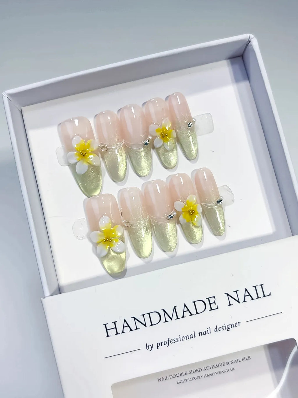 Nude Gold Yellow Metallic Flower Rhinestone press on nails angled view