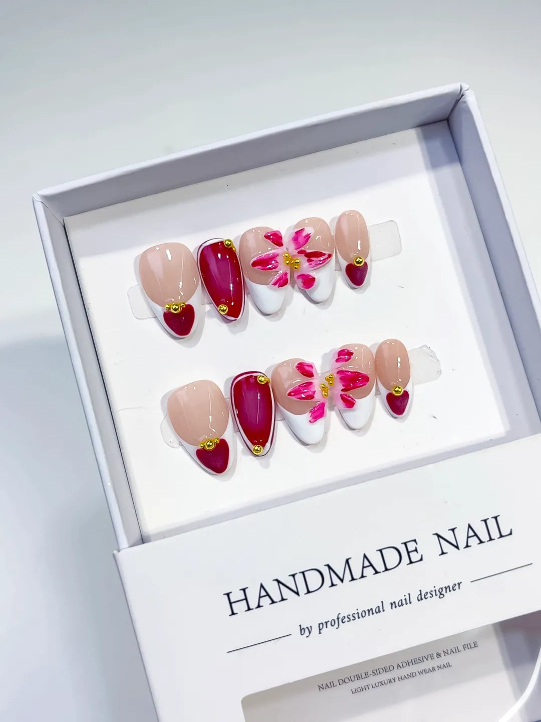 Nude White Red Pink French tip Flower Heart press on nails angled view