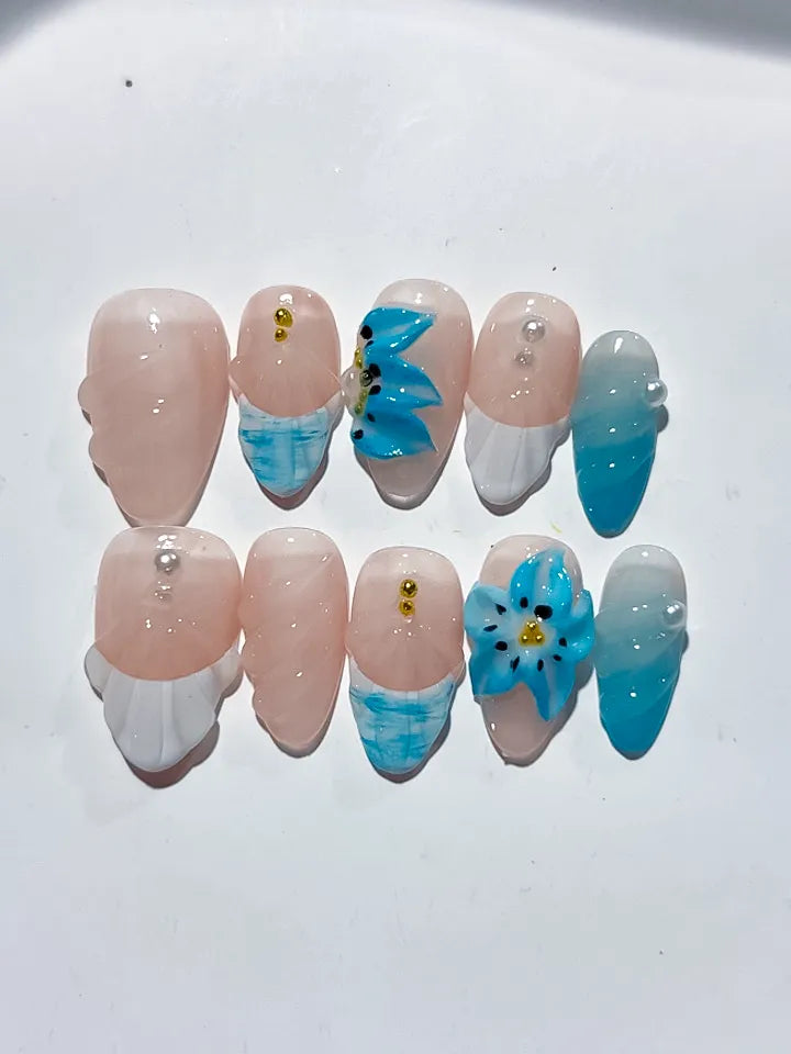 Nude White Blue French tip Flower Shell press on nails close up