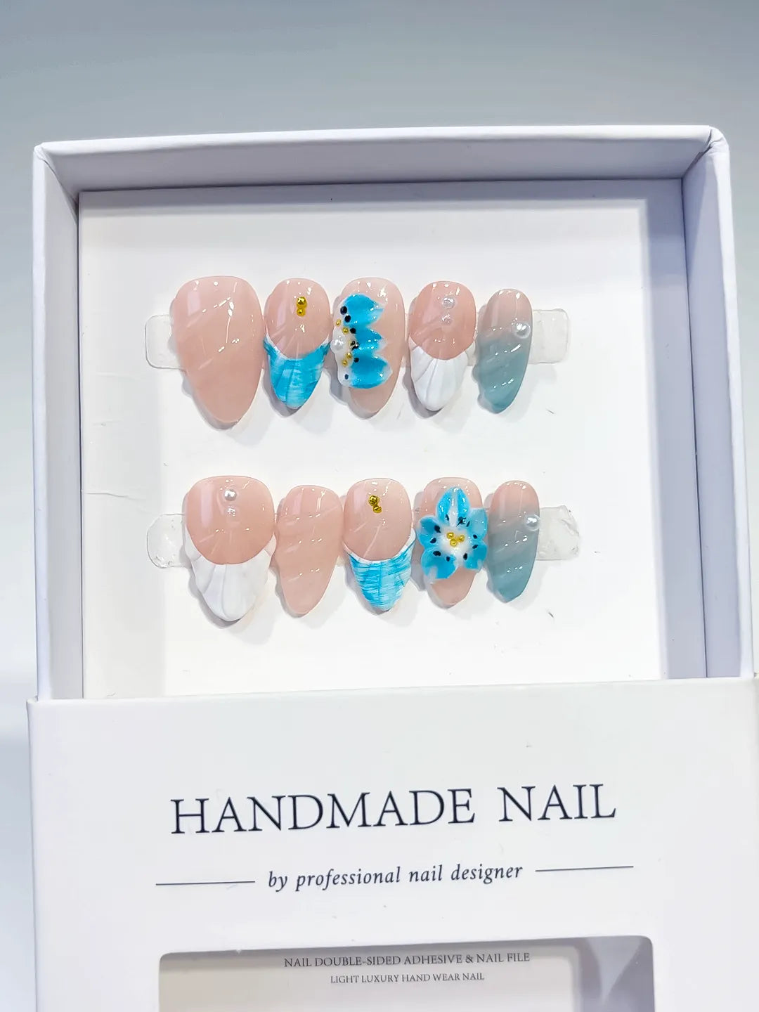 Nude White Blue French tip Flower Shell press on nails full set view