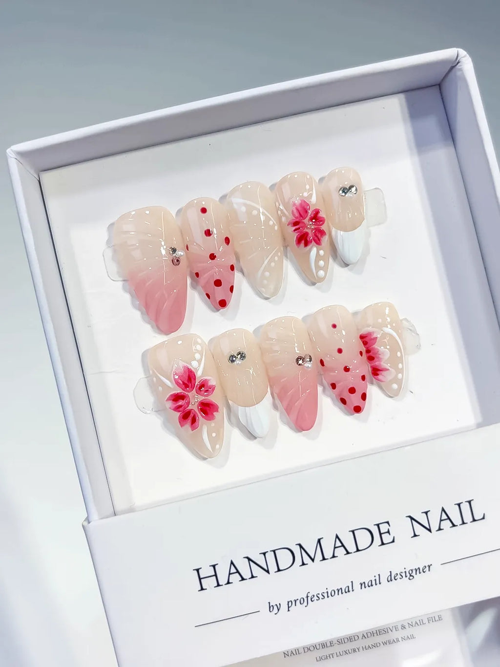 Nude Pink White Red Ombre Flower Dot Pattern Rhinestone press on nails angled view