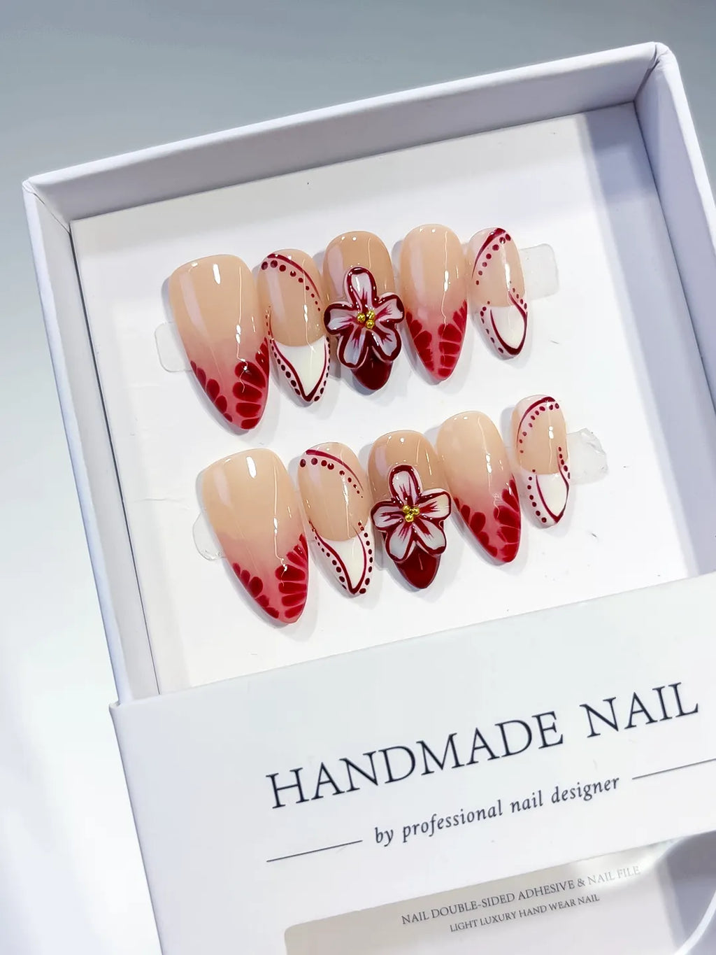 Nude Red White French tip Flower press on nails angled view
