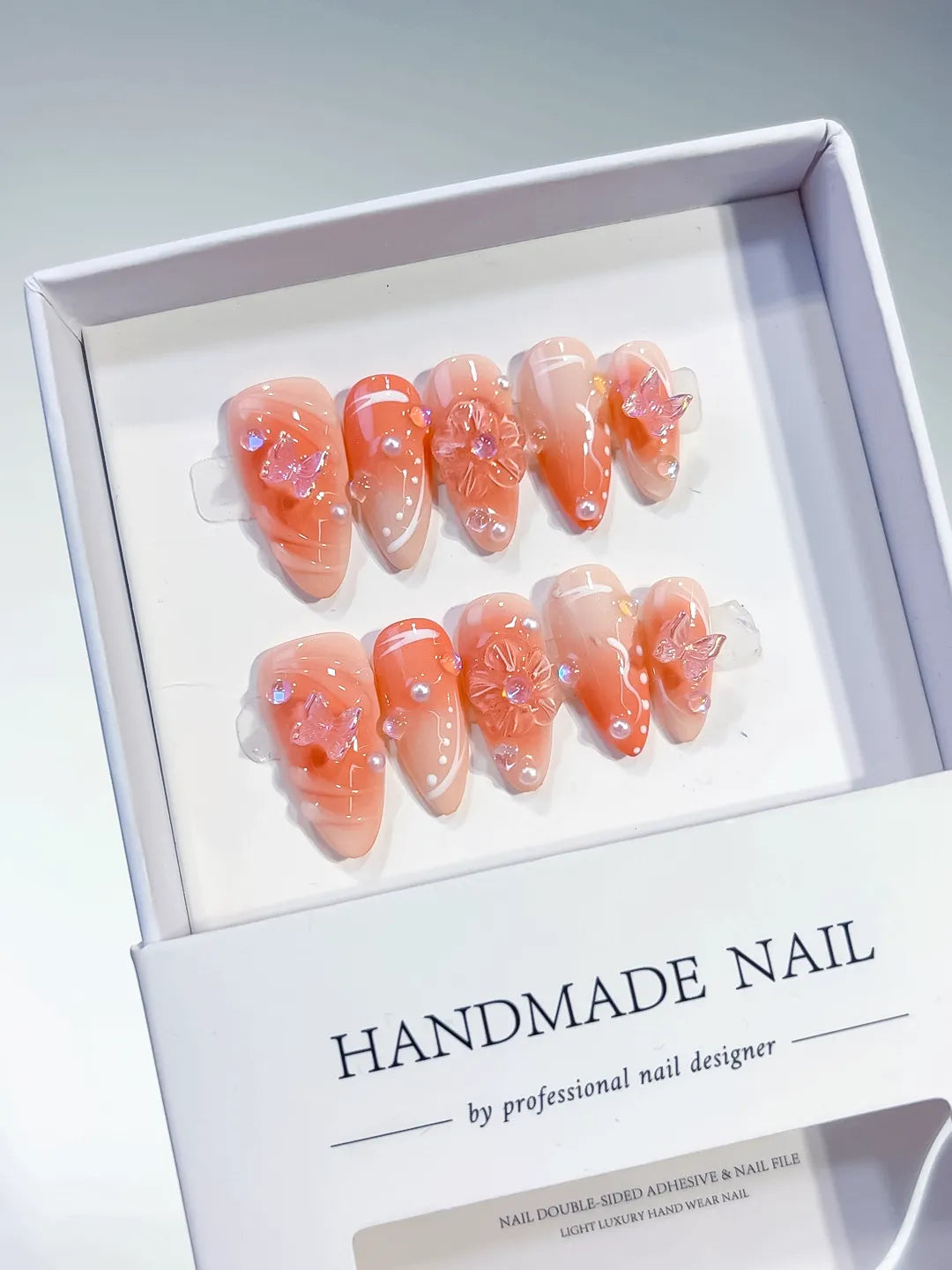 Nude White Ombre Butterfly Pearl press on nails angled view