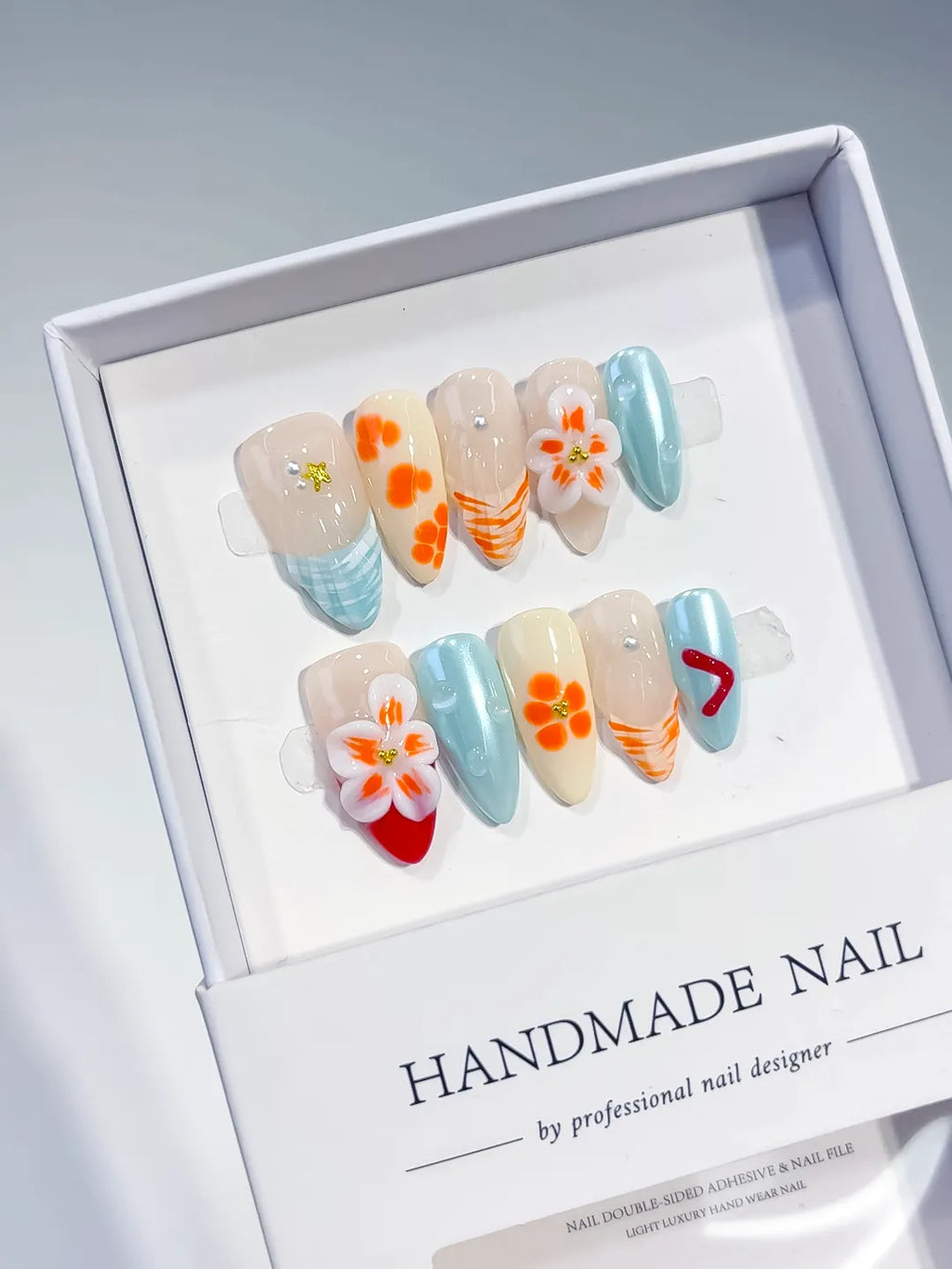 Nude Blue Orange White Red Abstract Flower Heart Shell press on nails angled view