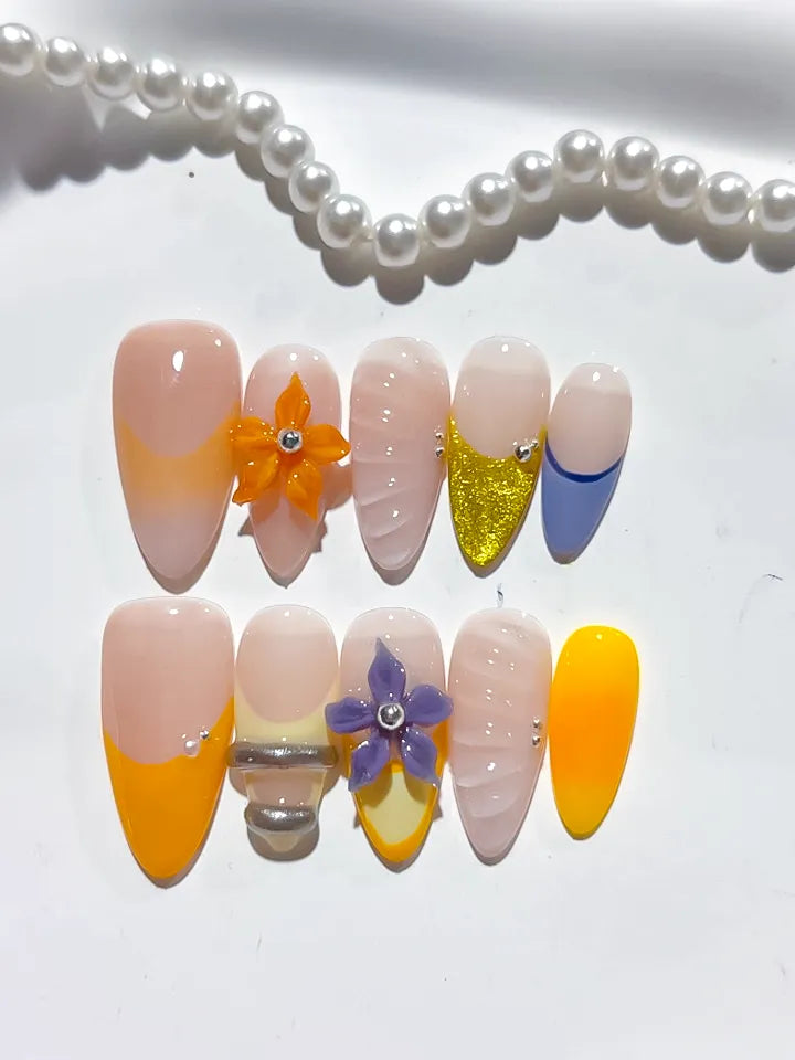 Nude Yellow Blue Gold French tip Flower Glitter press on nails detail view