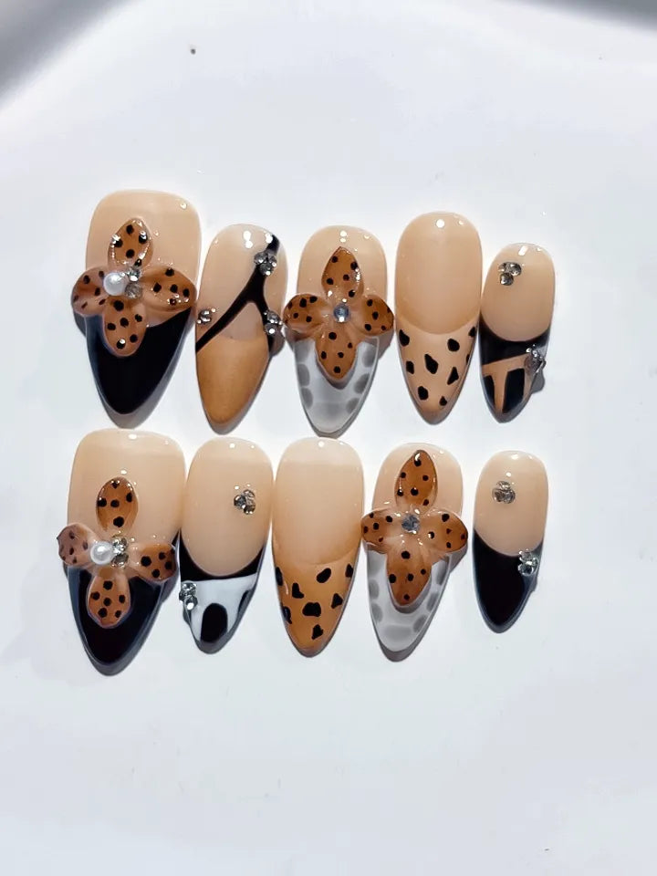 Nude Black Brown White French tip Cookie Animal Print Rhinestone press on nails close up