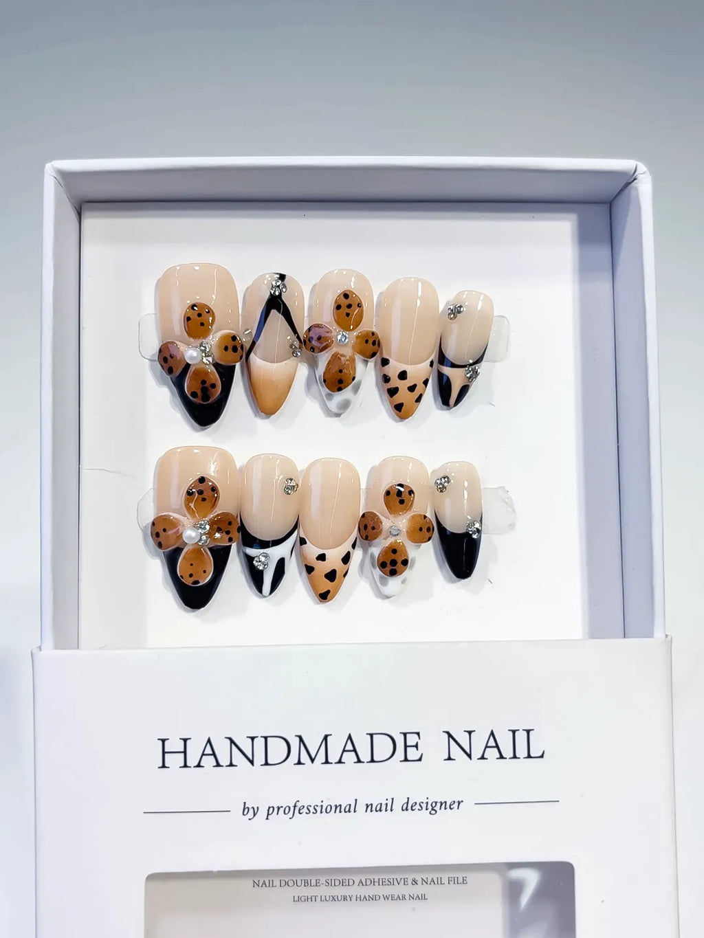 Nude Black Brown White French tip Cookie Animal Print Rhinestone press on nails full set view