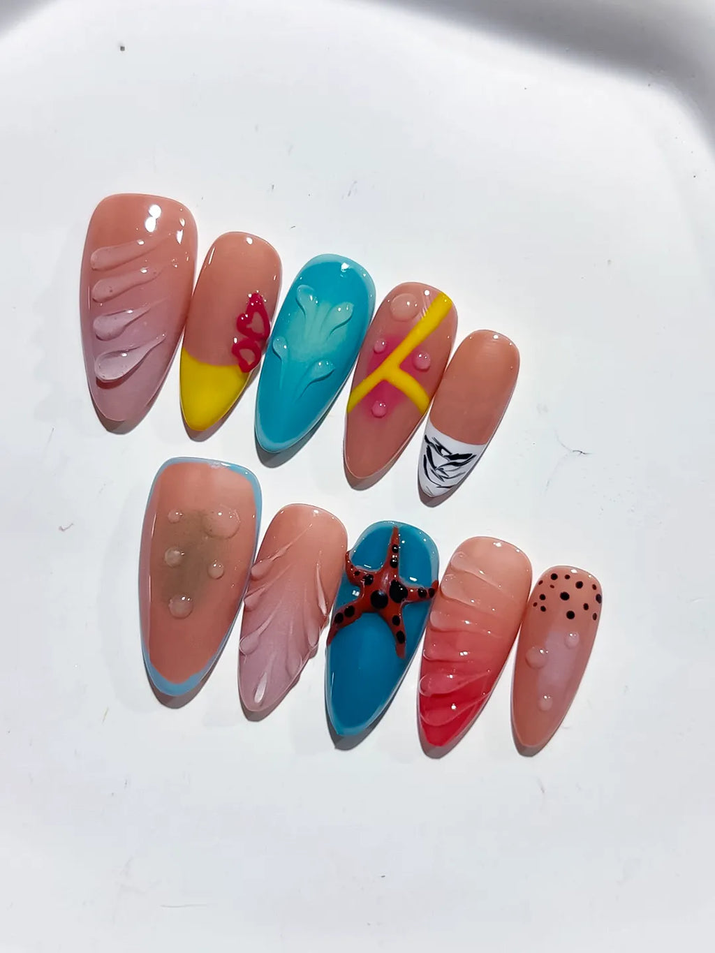 Pink Blue Yellow Red Black Abstract Starfish Leaf Dot Pattern press on nails detail view