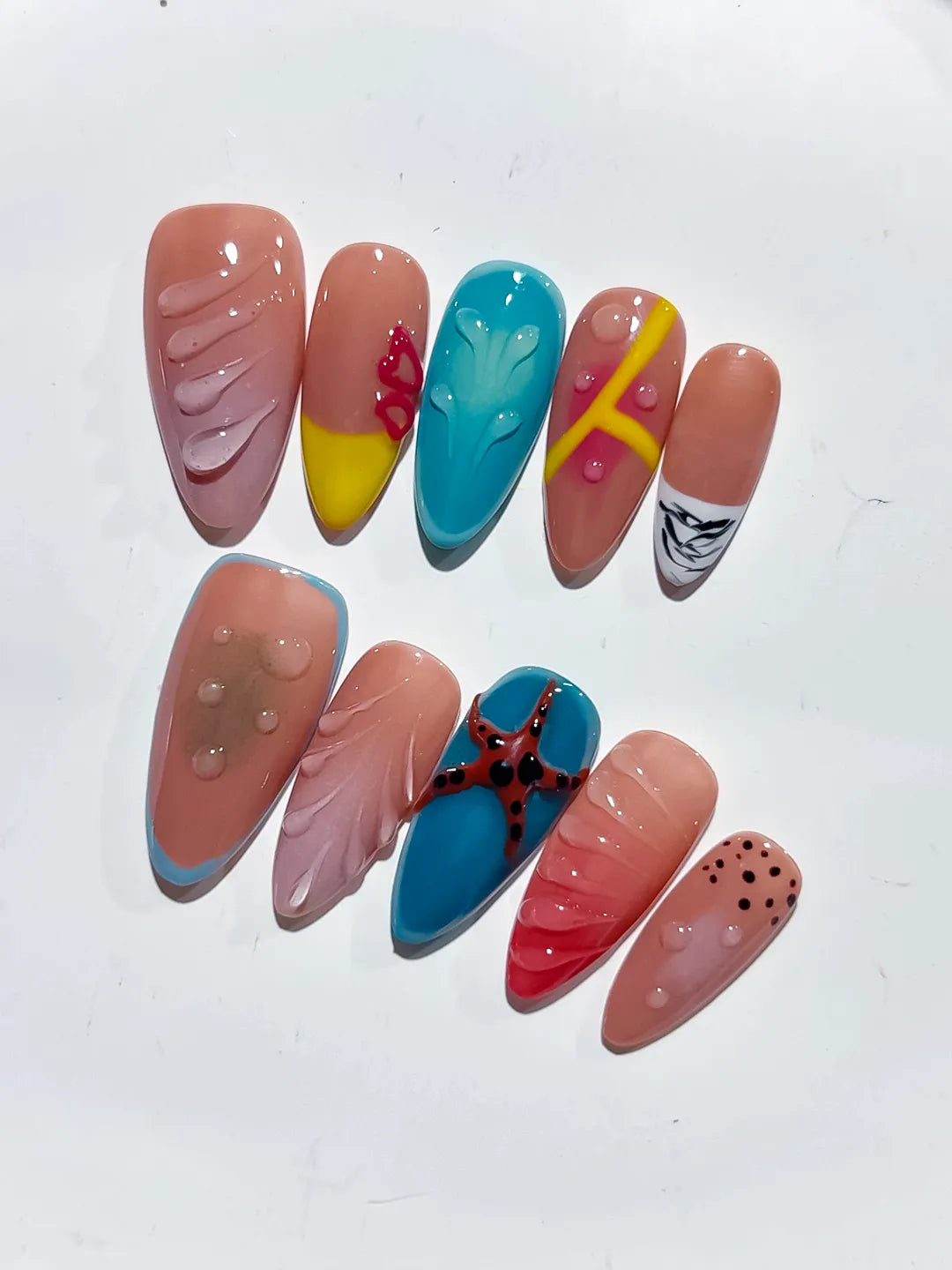 Pink Blue Yellow Red Black Abstract Starfish Leaf Dot Pattern press on nails detail view