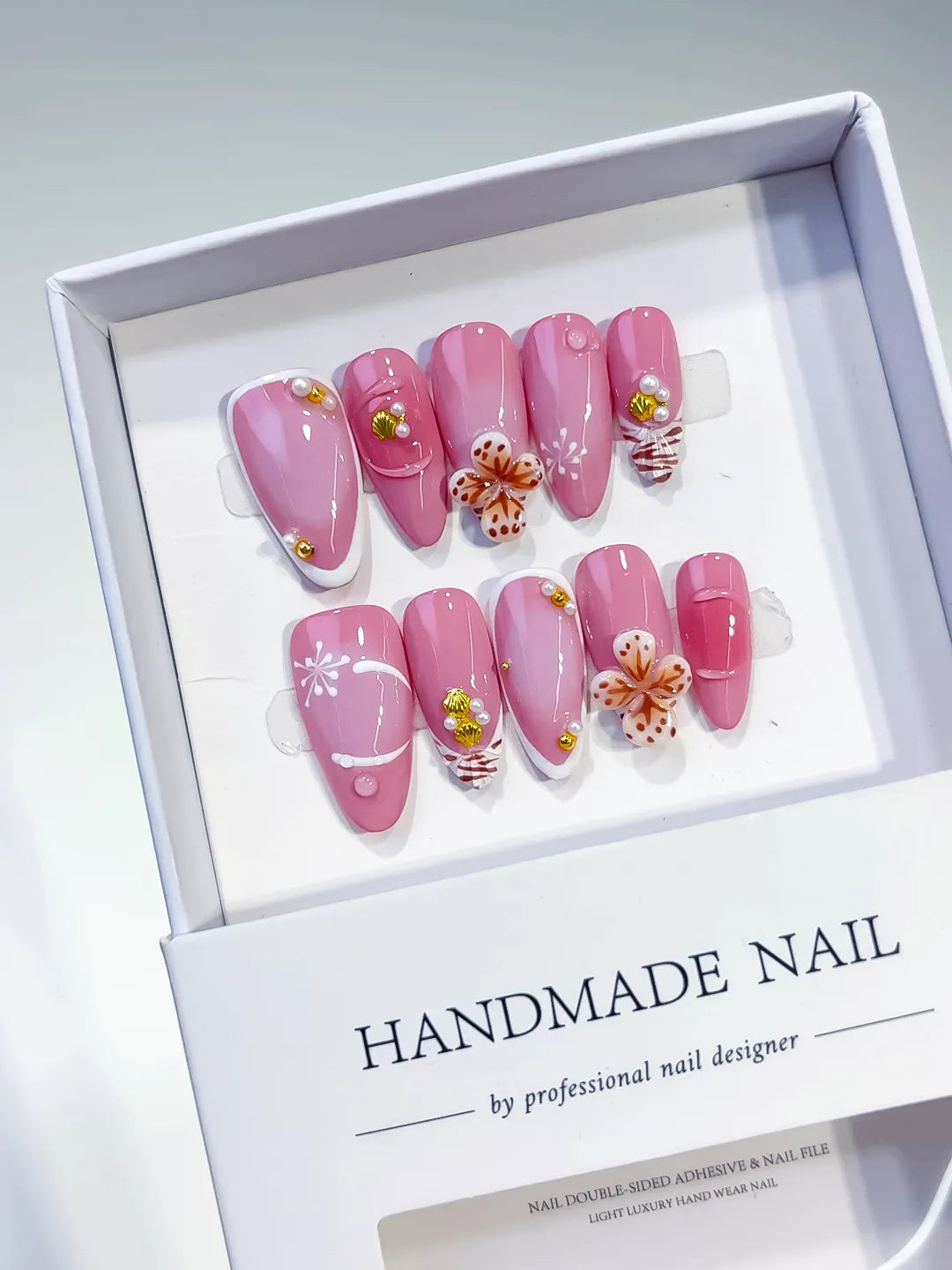 Pink White Gold Solid color Flower Pearl Metallic Charm press on nails angled view