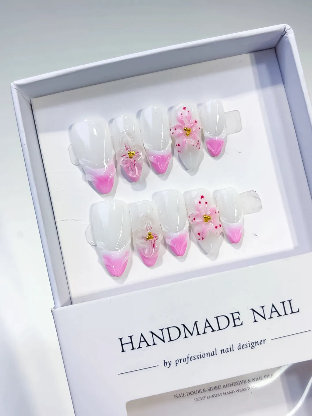 White Pink French tip Flower Bow press on nails angled view