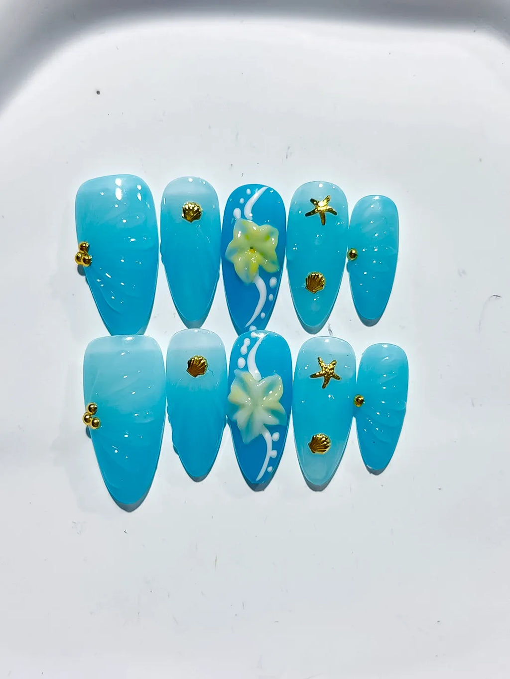 Blue Yellow Solid color Flower Starfish Shell press on nails close up