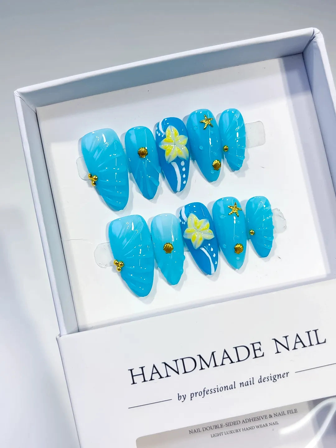 Blue Yellow Solid color Flower Starfish Shell press on nails angled view