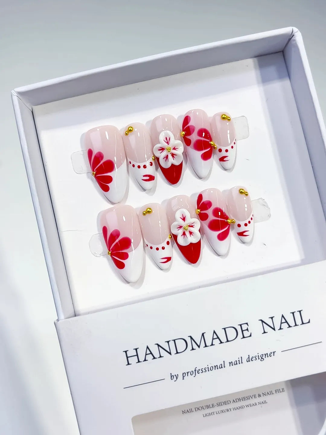 Nude White Red Gold French tip Flower Stud press on nails angled view