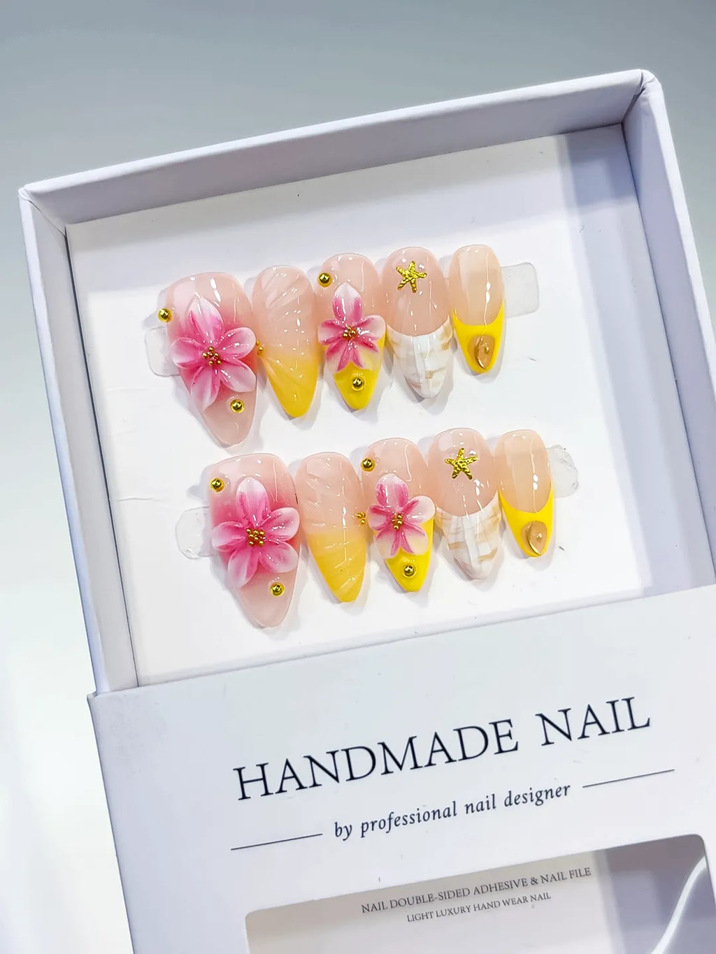 Nude Pink Yellow White Ombre Flower Star Shell press on nails angled view
