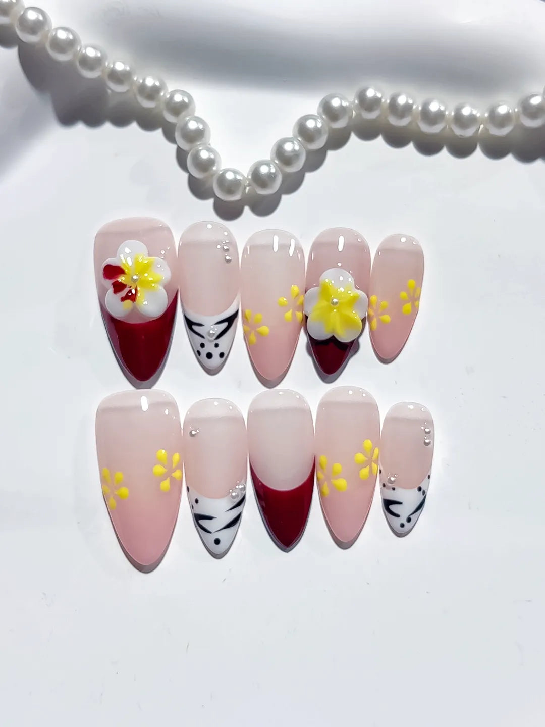 Nude Red White Yellow French tip Flower Animal Print press on nails detail view