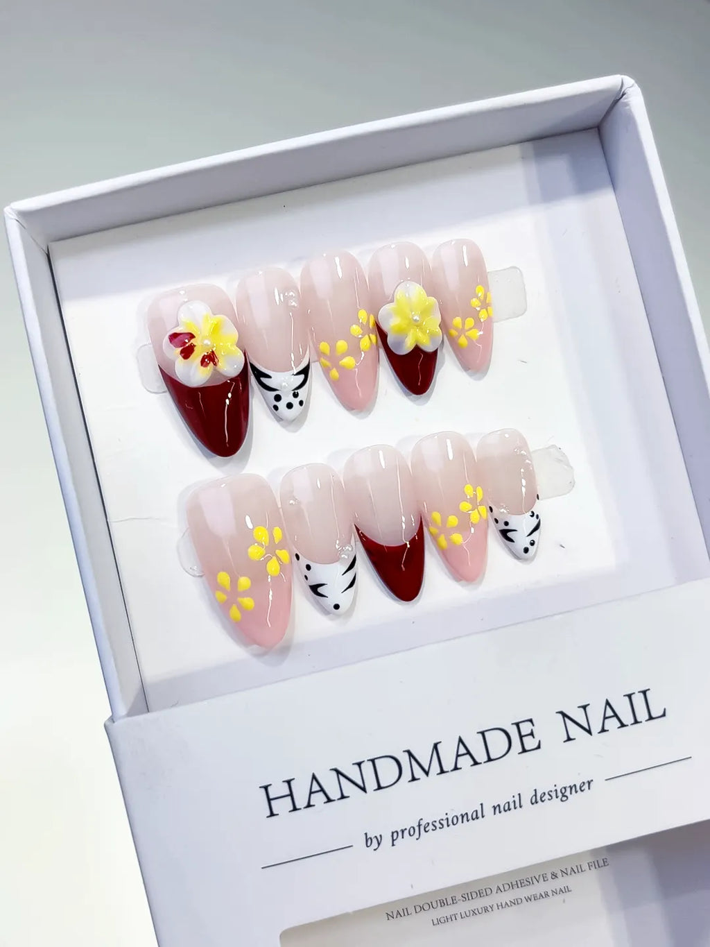 Nude Red White Yellow French tip Flower Animal Print press on nails angled view