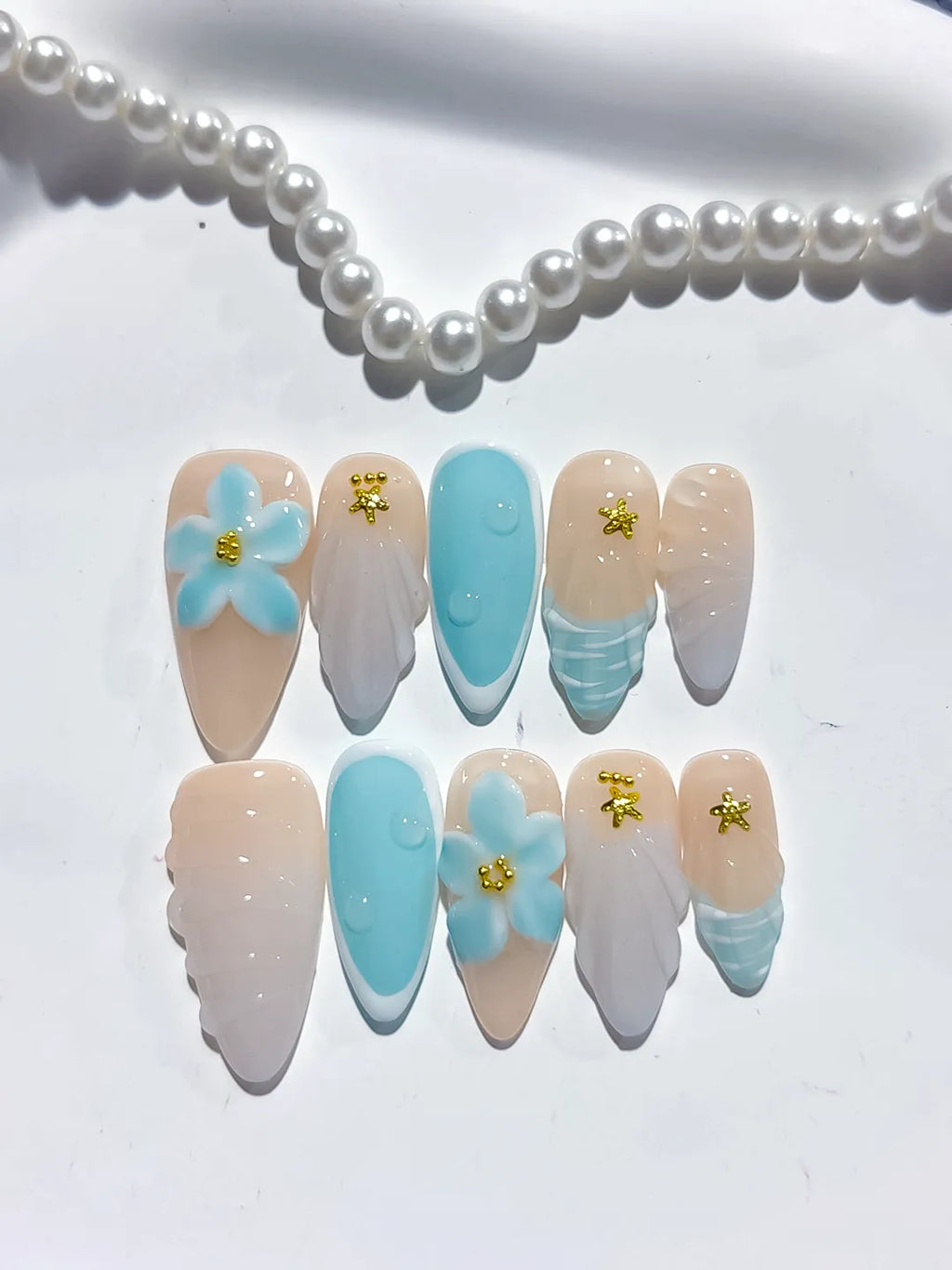 Nude Blue White French tip Flower Shell Star press on nails detail view