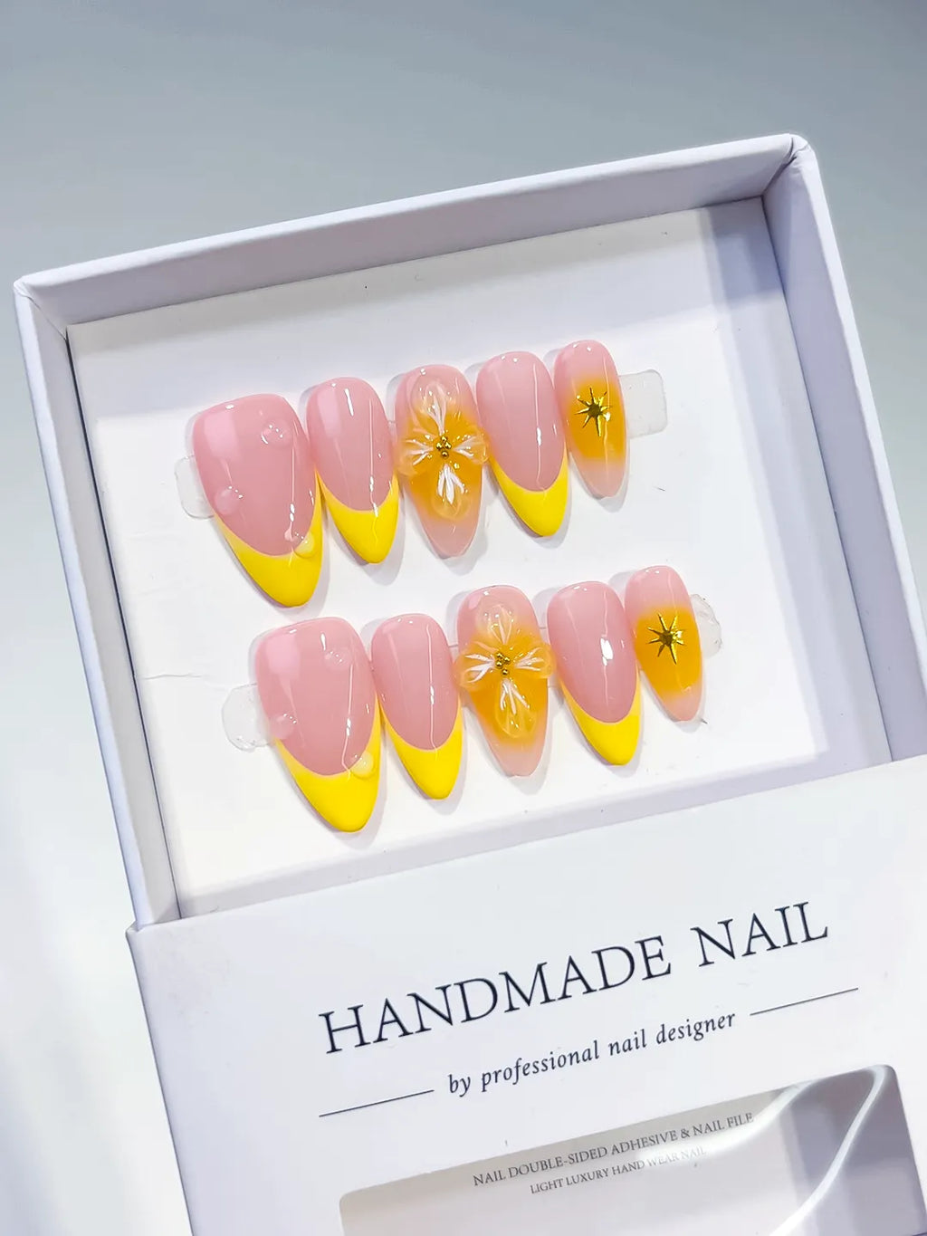 Pink Yellow French tip Flower press on nails angled view