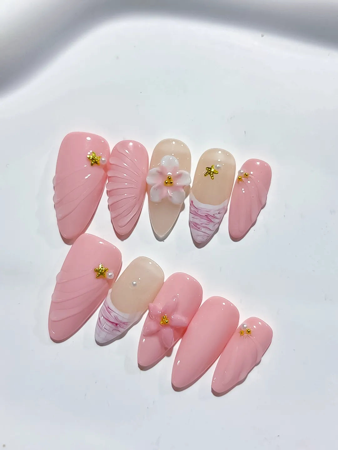 Pink Nude White Solid color Flower Star Shell press on nails close up