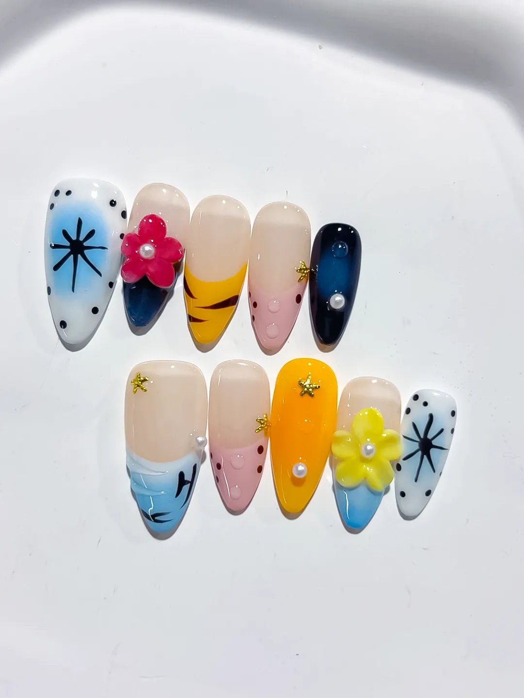 Blue Yellow Pink White Black Abstract Flower Star Dot Pattern press on nails detail view