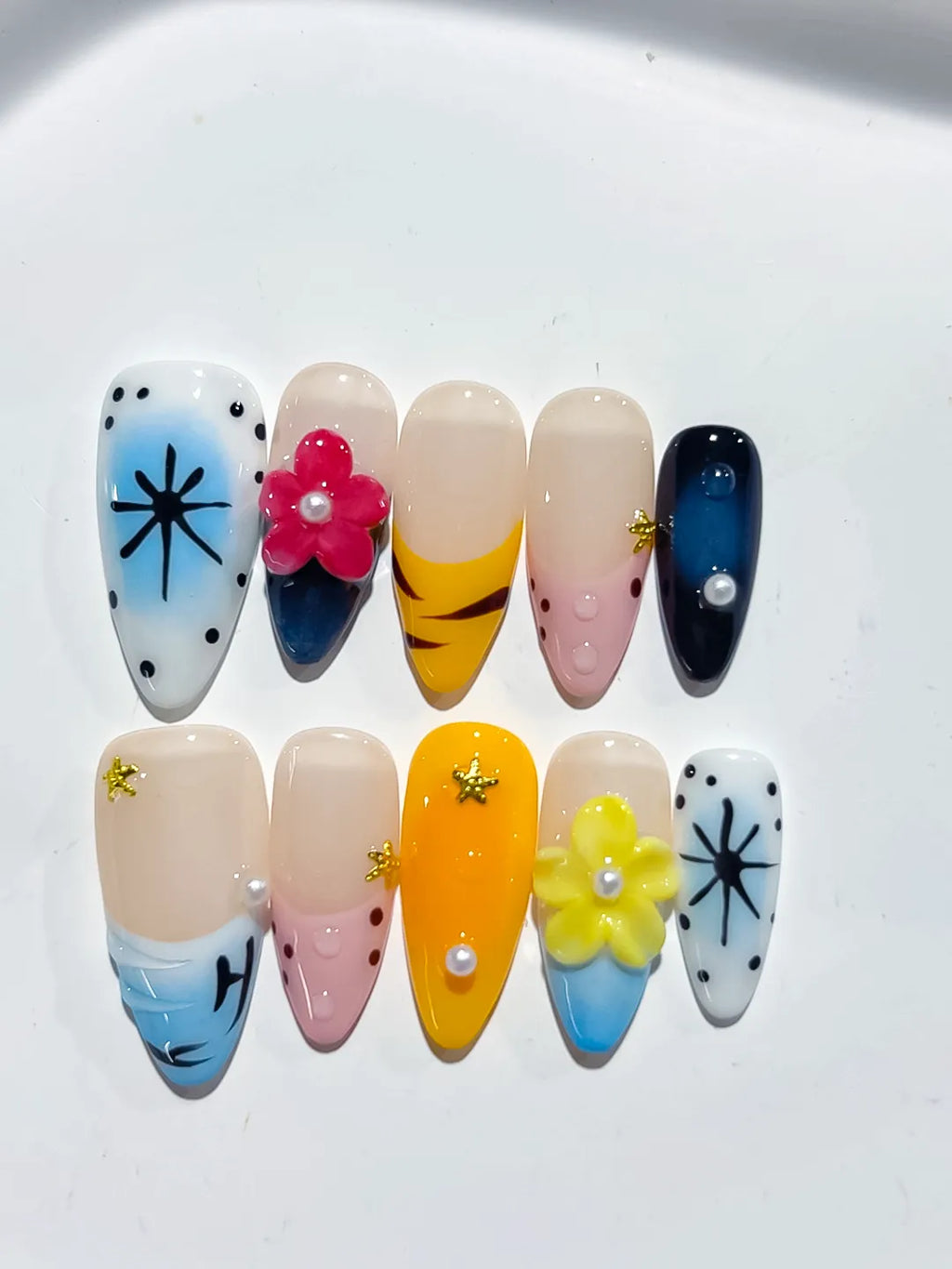 Blue Yellow Pink White Black Abstract Flower Star Dot Pattern press on nails detail view