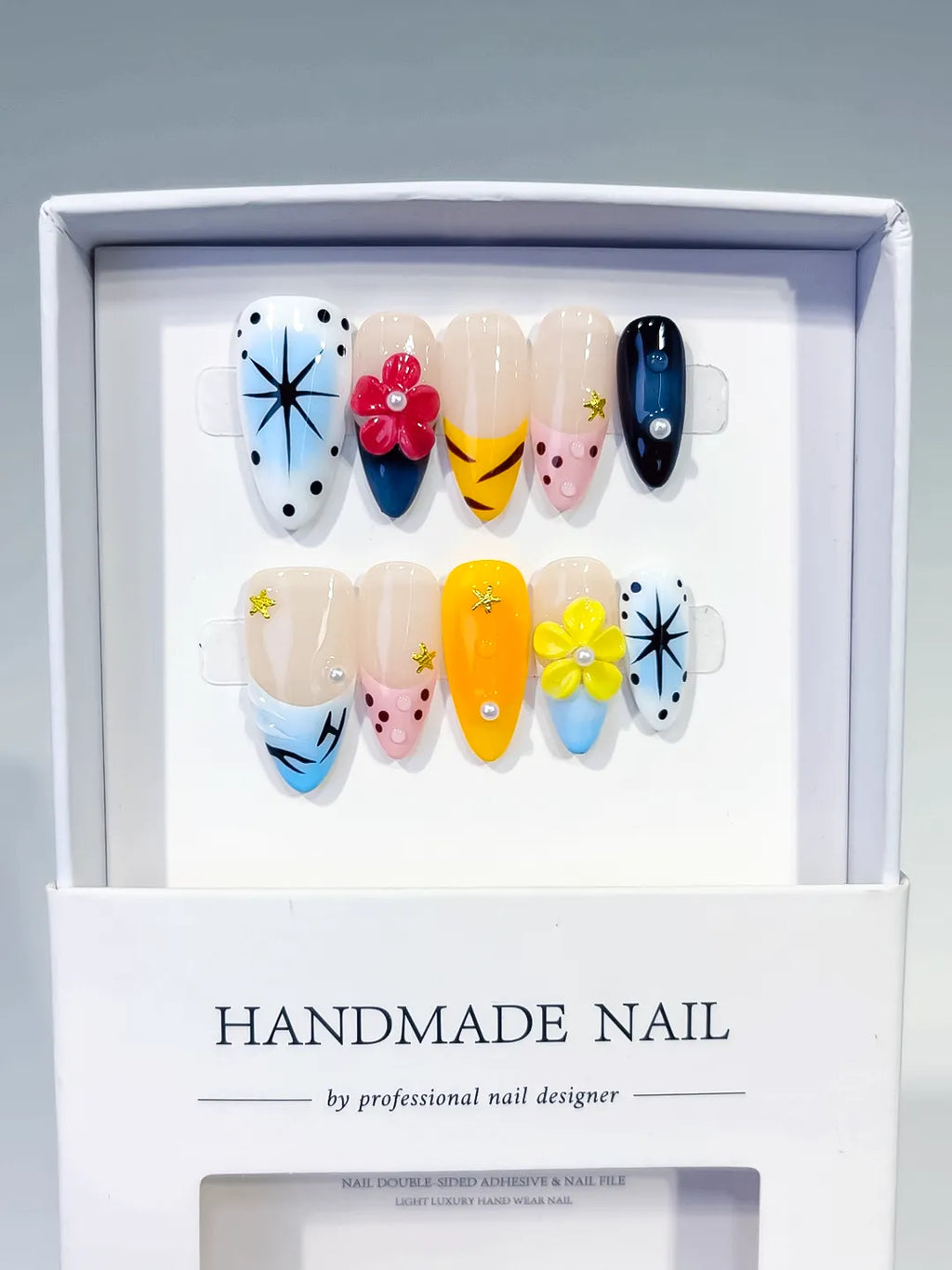 Blue Yellow Pink White Black Abstract Flower Star Dot Pattern press on nails full set view