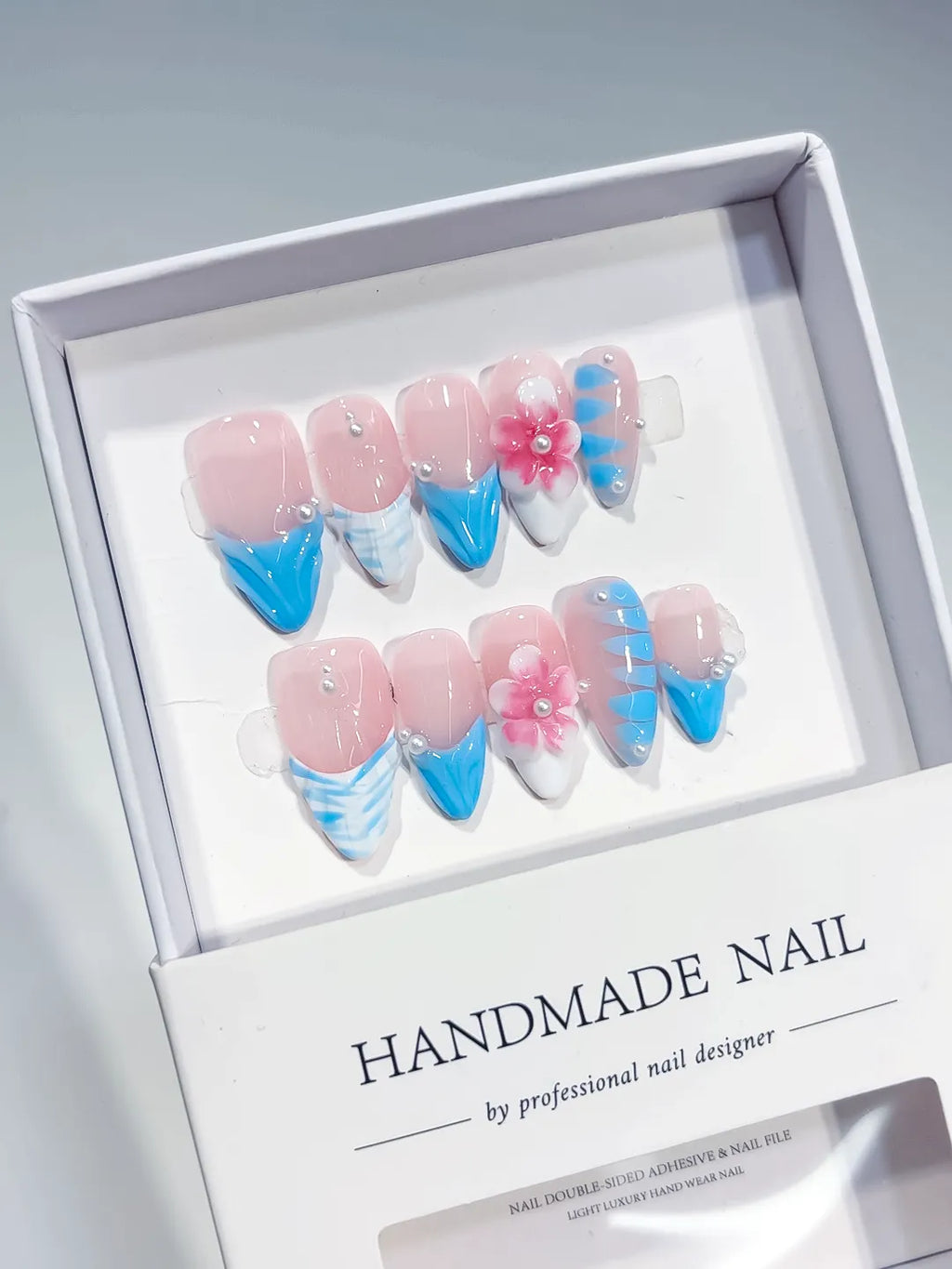 Pink Blue White French tip Flower Pearl Shell press on nails angled view