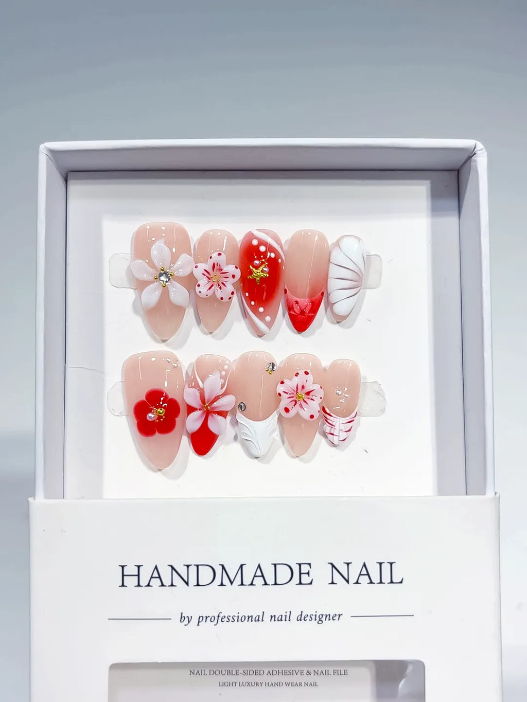 Nude Red White Abstract Flower Star Shell press on nails detail view