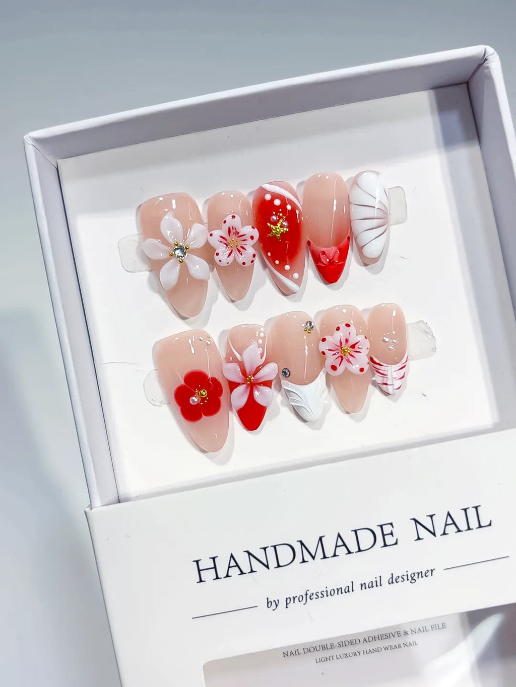 Nude Red White Abstract Flower Star Shell press on nails detail view