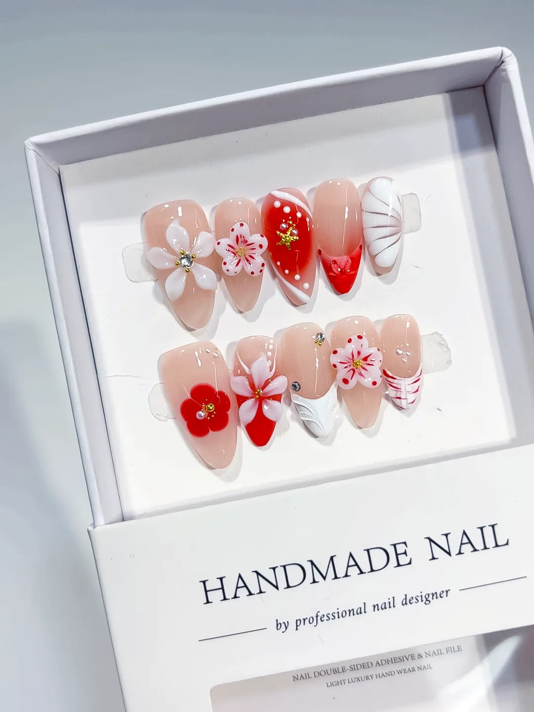 Nude Red White Abstract Flower Star Shell press on nails detail view