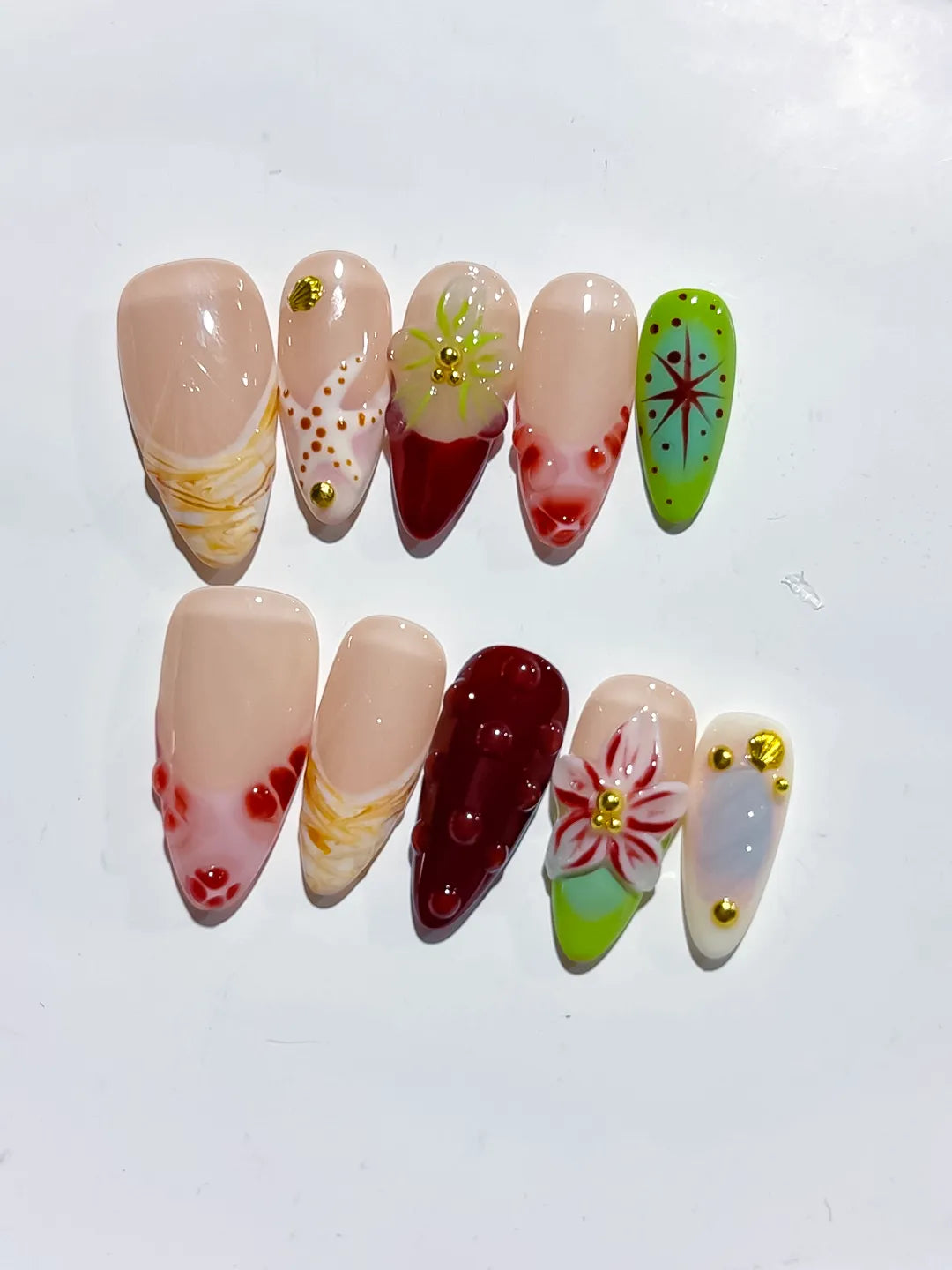 Nude Red Green White Abstract Flower Star Dot Pattern press on nails angled view