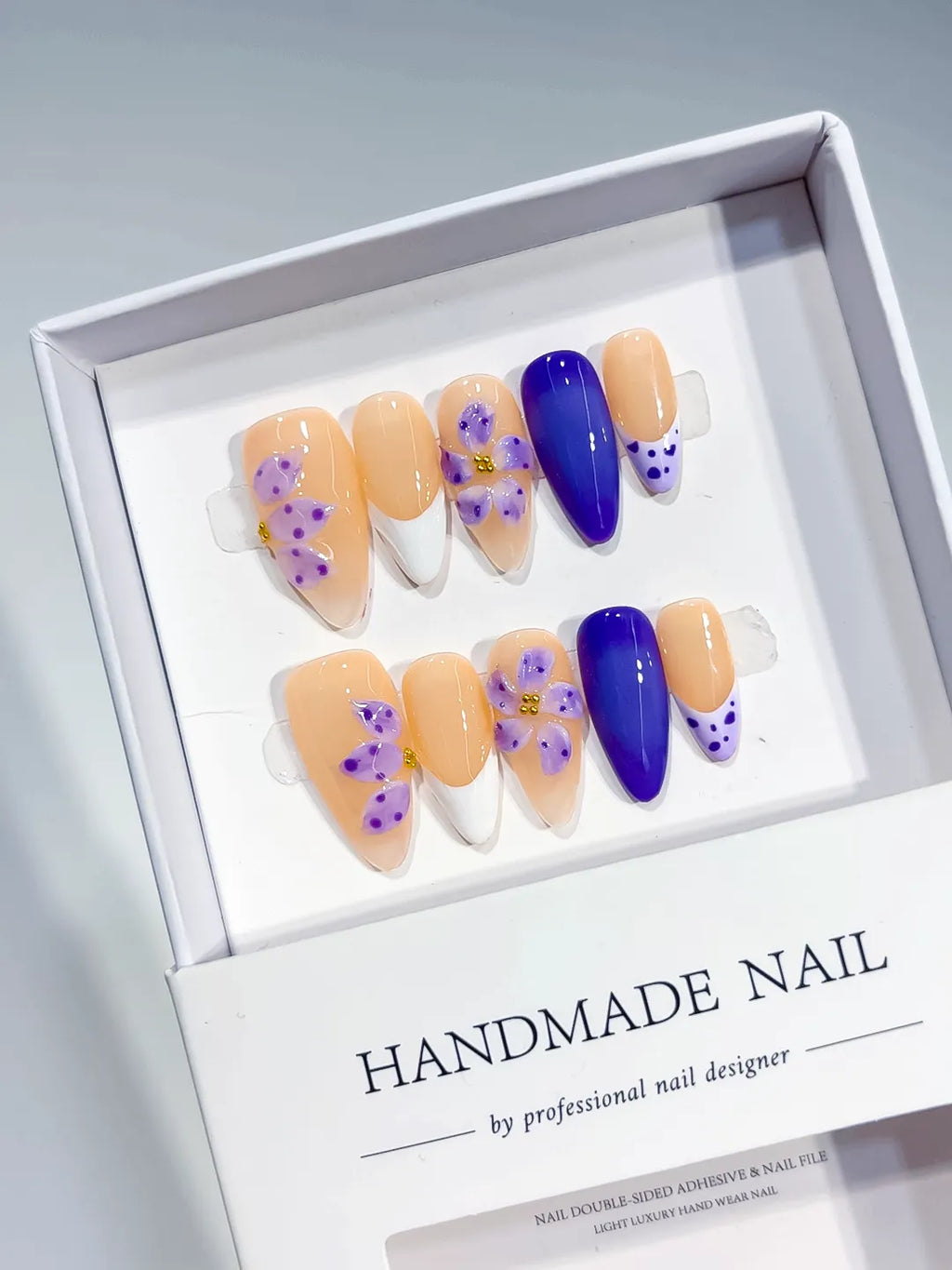 Nude White Purple French tip Flower Dot Pattern press on nails angled view