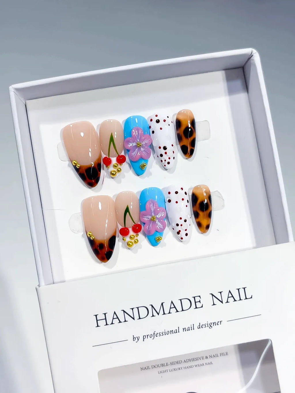 Nude Brown Blue White Red Abstract Cherry Flower Animal Print Dot Pattern press on nails angled view