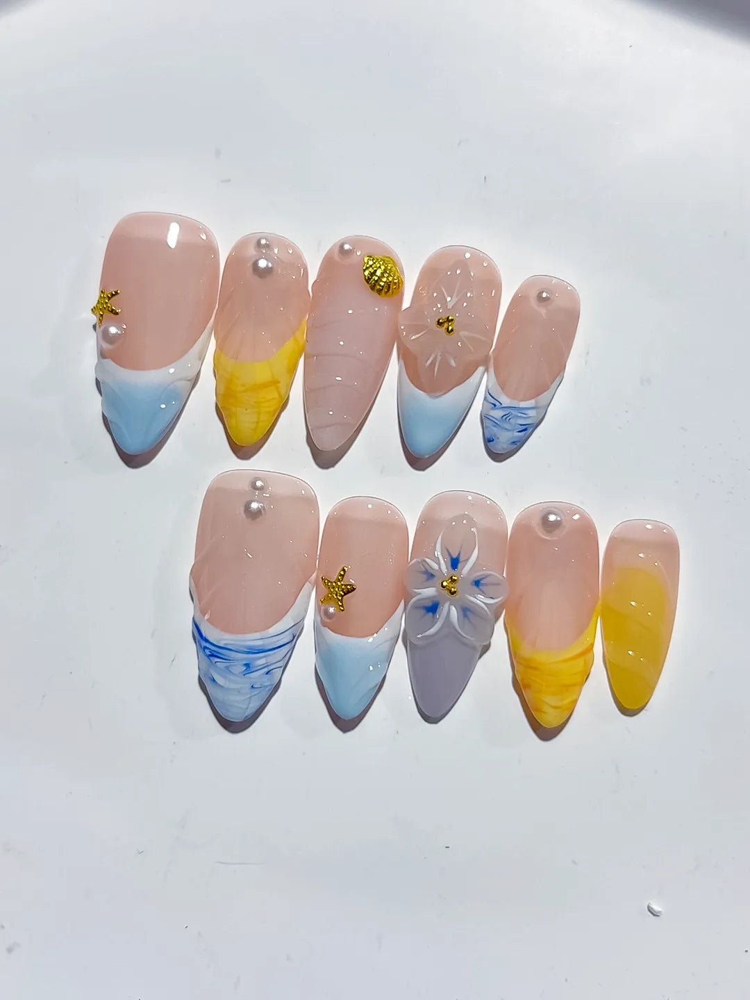 Nude Blue Yellow White French tip Flower Star Shell press on nails close up
